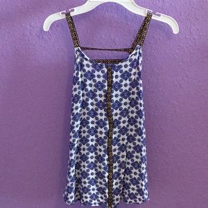 Blue and white open back flows tank top